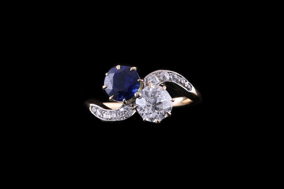 Diamond ring with two on sale sapphires