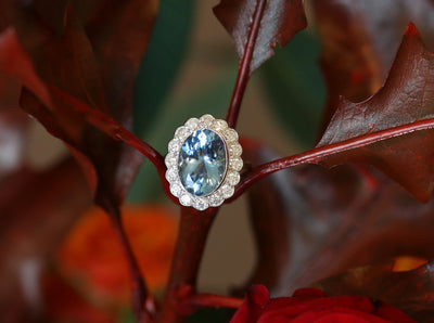 Latest Advert - 18ct White Gold Diamond and Aquamarine Oval Cluster Ring