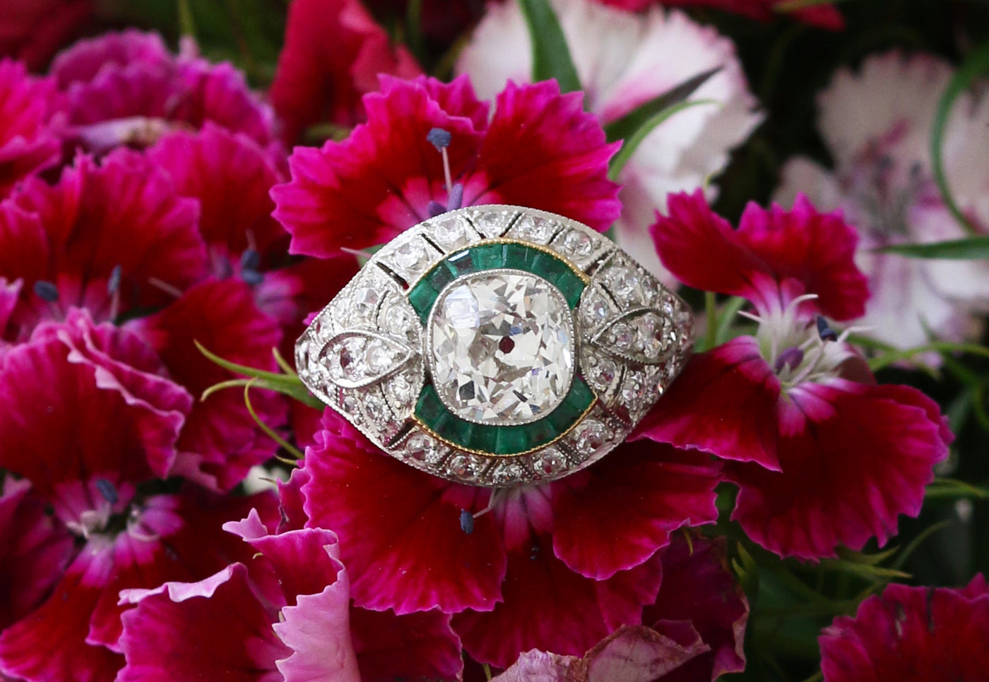 Latest Advert - Platinum Diamond and Emerald Bombe Ring