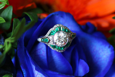 Latest Advert - Platinum Diamond and Emerald Dress Ring