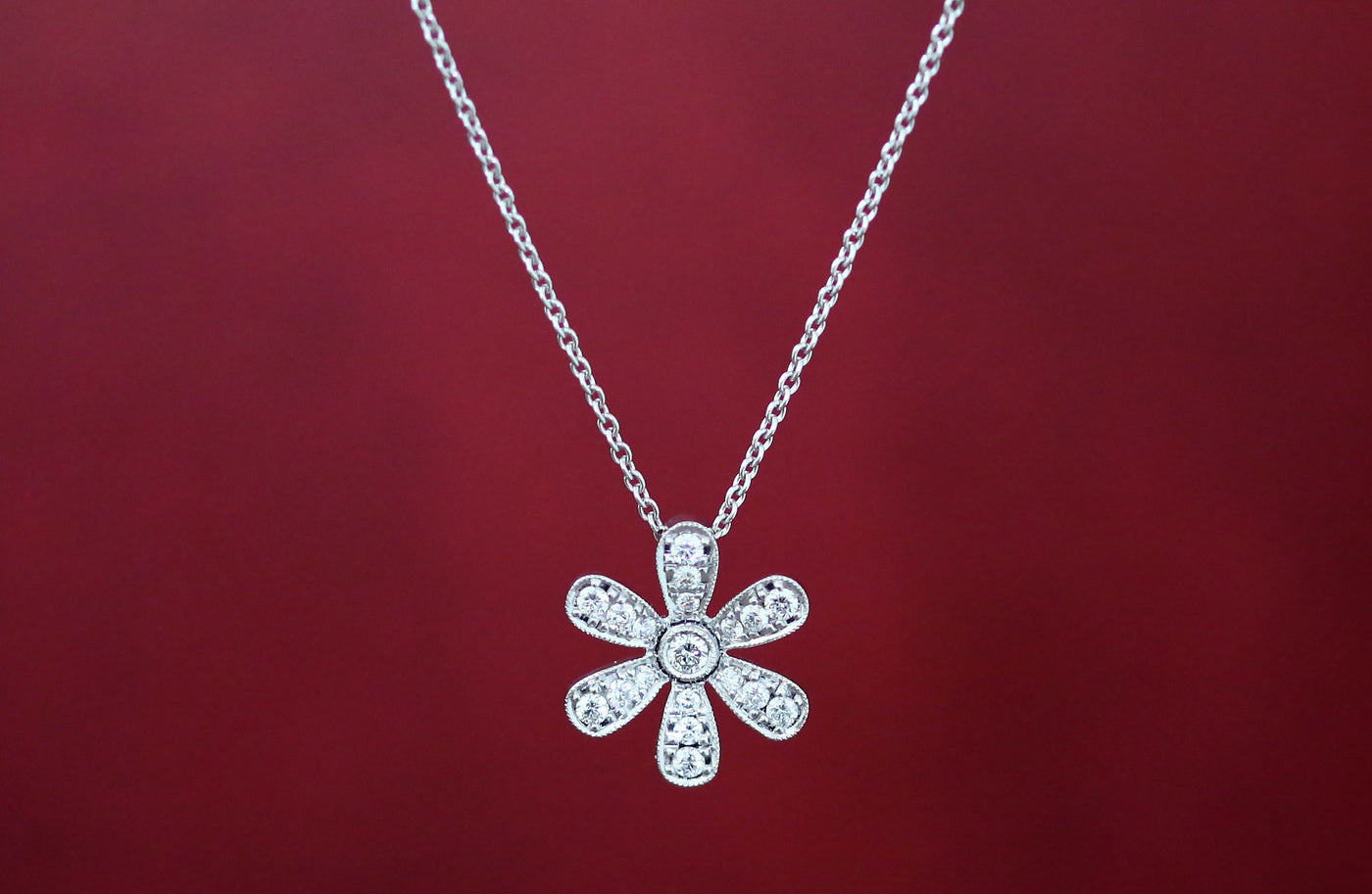 Latest Advert - 18ct White Gold Diamond Flower Pendant