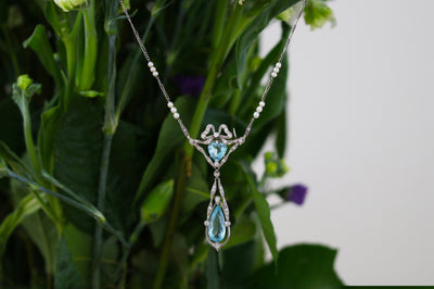 Latest Advert - Belle Epoque Platinum Diamond, Aquamarine and Seed Pearl Pendant
