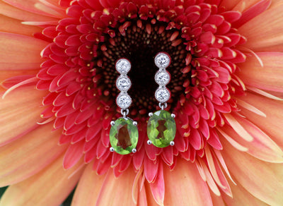 Latest Advert - 18ct White Gold Diamond and Peridot Drop Earrings