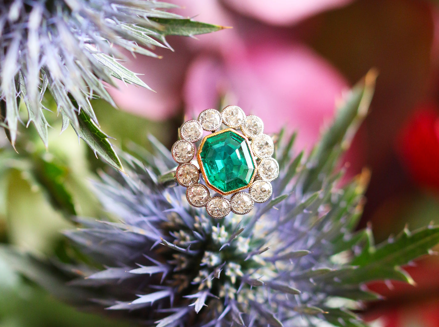 Latest Advert - Platinum Diamond and Emerald Cluster Ring