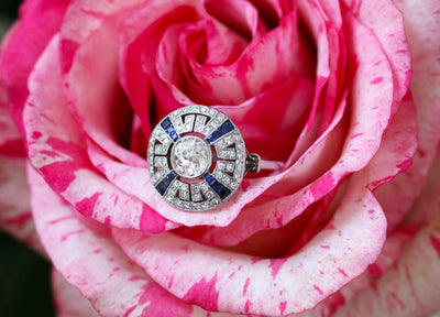 Latest Advert - Platinum Diamond and Sapphire Round Dress Ring