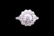 Platinum Diamond Cluster Ring with Diamond Shoulders
