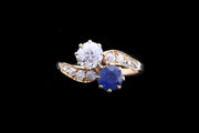 Edwardian 18ct Yellow Gold Diamond and Sapphire Two Stone Twist Ring with Diamond Shoulders