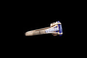 18ct Yellow Gold Tanzanite Single Stone Ring with Diamond Shoulders