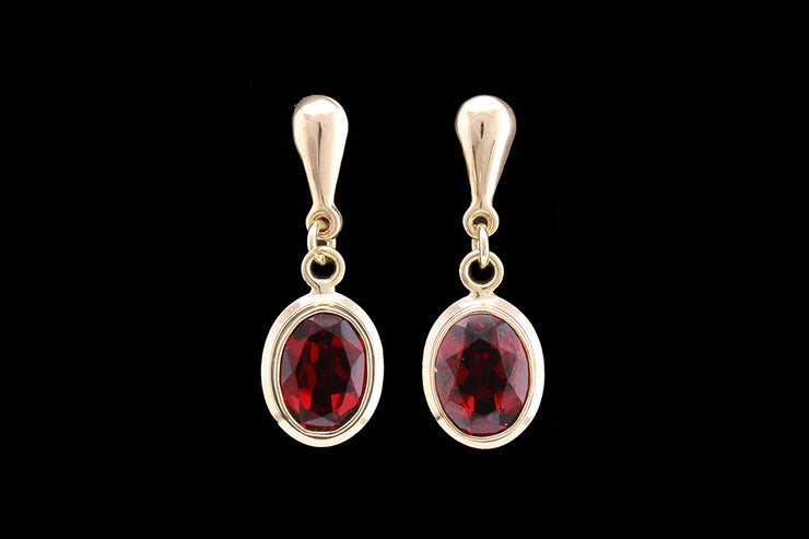 9ct Yellow Gold Garnet Oval Drop Earrings with Gold Surround