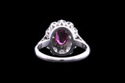 18ct White Gold Diamond and Ruby Oval Cluster Ring