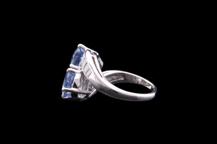 Platinum and 10% Iridium Diamond and Cornflower Sapphire Two Stone Twist Ring