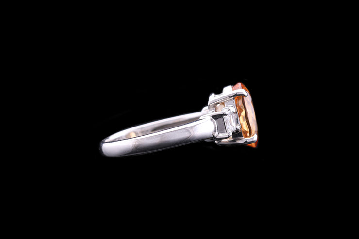 Platinum Diamond and Topaz Three Stone Ring