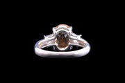 Platinum Diamond and Topaz Three Stone Ring