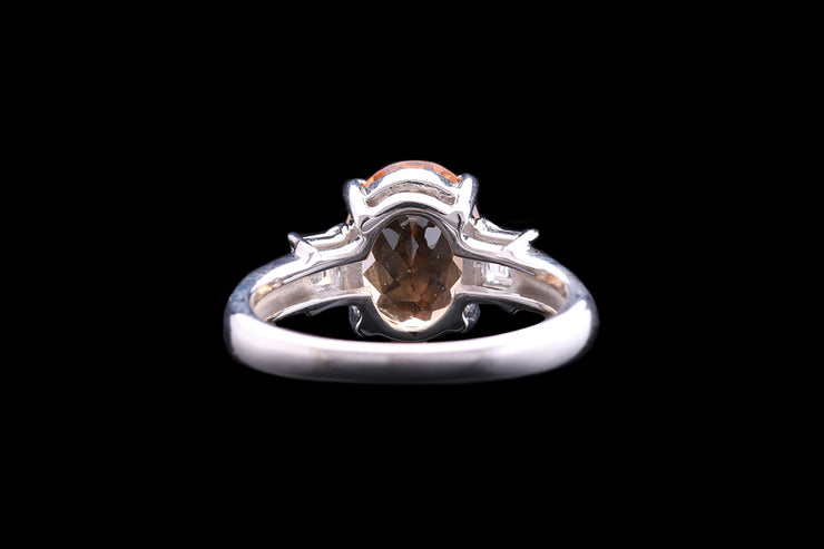 Platinum Diamond and Topaz Three Stone Ring