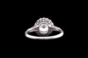 Platinum Diamond Cluster Ring with Diamond Shoulders