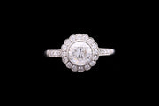 Platinum Diamond Cluster Ring with Diamond Shoulders