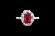 Platinum Diamond and Burmese Ruby Oval Cluster Ring with Diamond Shoulders