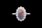 Platinum Diamond and Black Opal Oval Cluster Ring