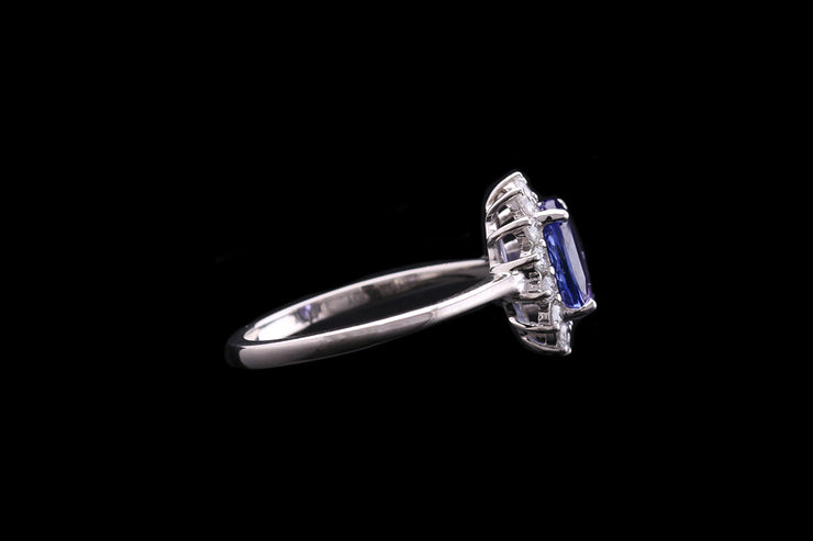 Platinum Diamond and Tanzanite Oval Cluster Ring