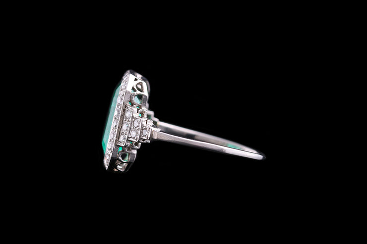 Art Deco Platinum Diamond and Colombian Emerald Cluster Ring with Diamond Shoulders