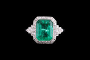 Art Deco Platinum Diamond and Colombian Emerald Cluster Ring with Diamond Shoulders