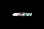 Platinum Diamond and Emerald Half Eternity Ring