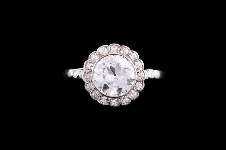 French Art Deco Platinum Diamond Halo Ring with Diamond Shoulders