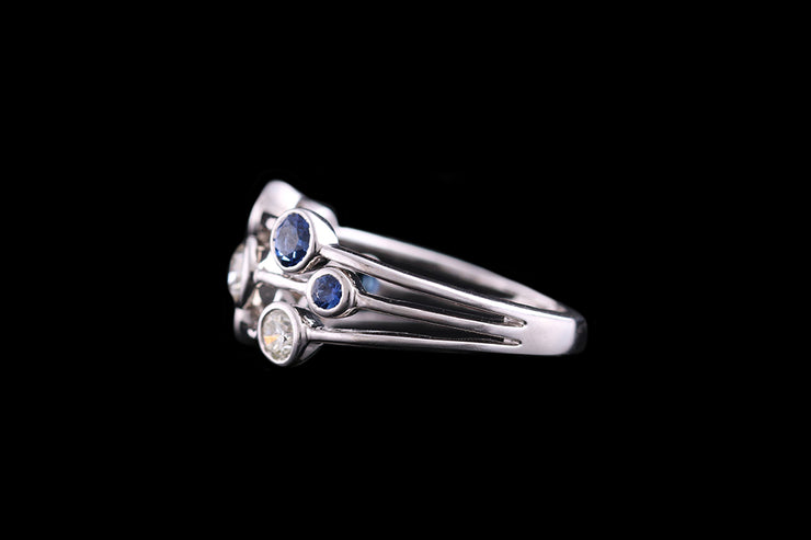 Platinum Diamond and Sapphire Triple Row Dress Ring
