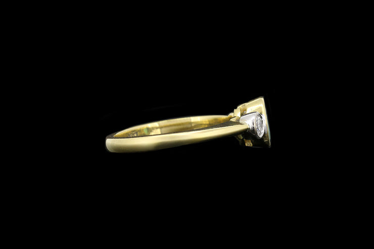18ct Yellow Gold Diamond and Emerald Three Stone Ring