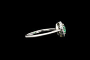 Art Deco Platinum Diamond and Emerald Round Cluster Ring