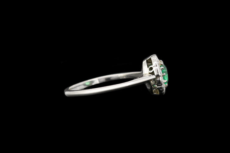 Art Deco Platinum Diamond and Emerald Round Cluster Ring