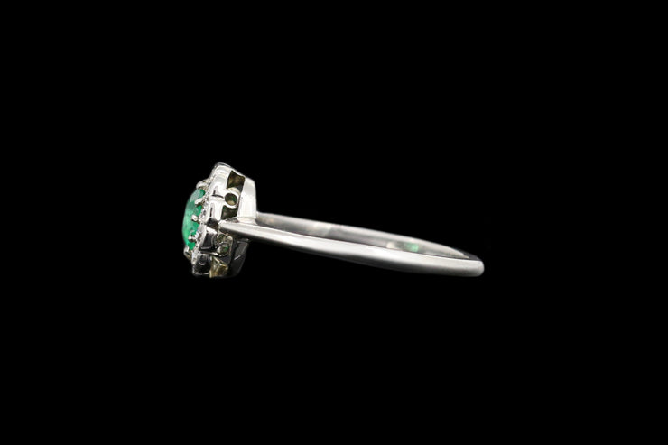 Art Deco Platinum Diamond and Emerald Round Cluster Ring