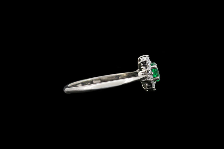 Platinum and 18ct White Gold Diamond and Emerald Cluster Ring
