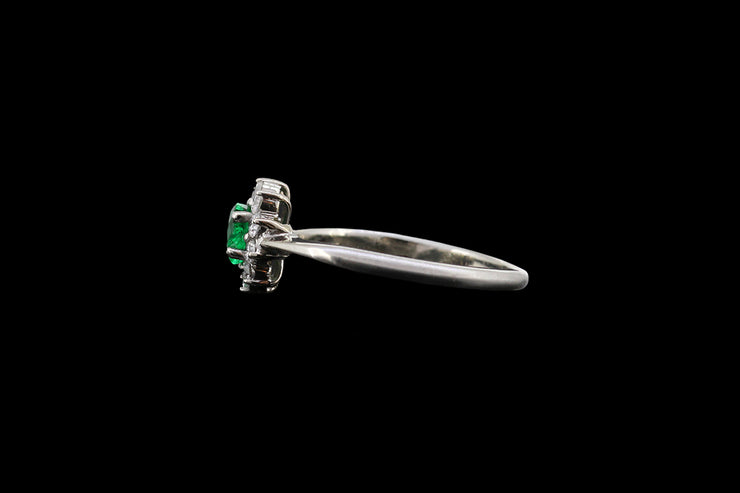 Platinum and 18ct White Gold Diamond and Emerald Cluster Ring