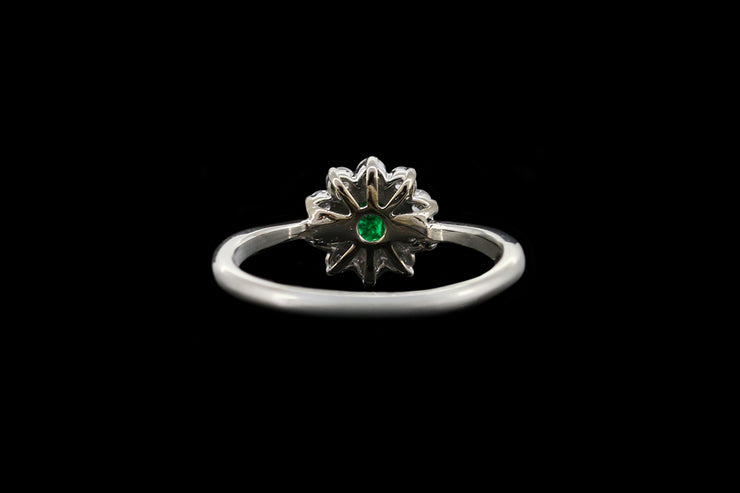 Platinum and 18ct White Gold Diamond and Emerald Cluster Ring