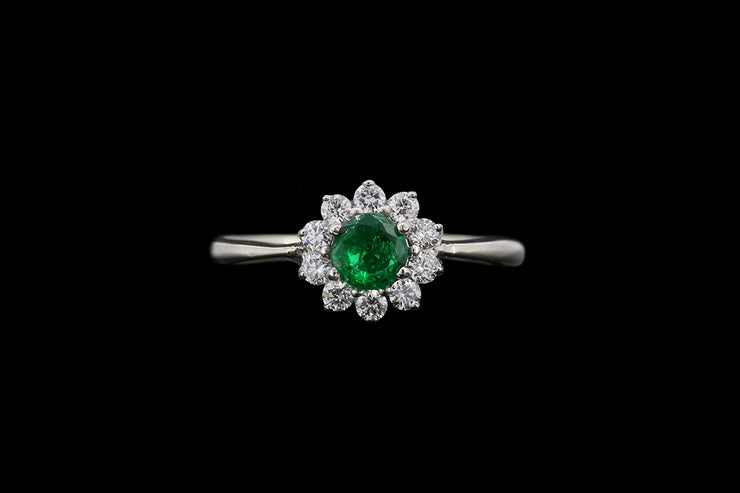 Platinum and 18ct White Gold Diamond and Emerald Cluster Ring