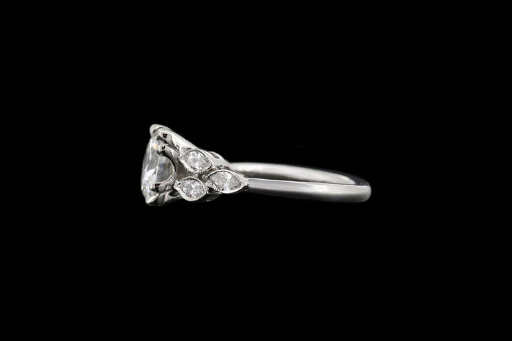 Platinum Diamond Single Stone Ring with Decorative Diamond Shoulders