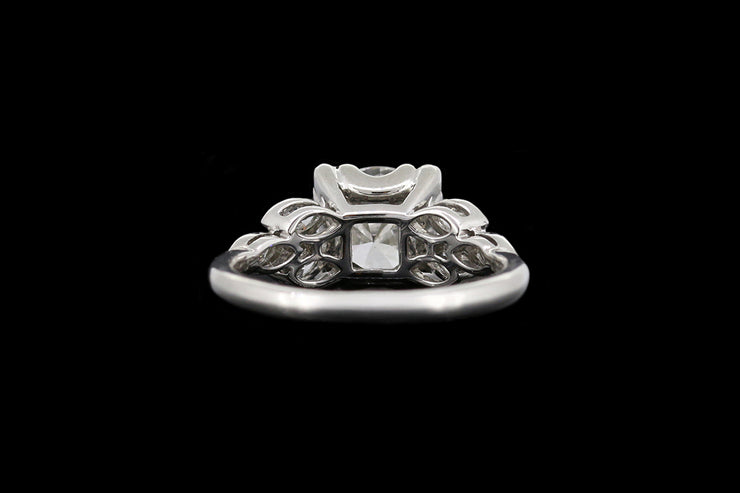 Platinum Diamond Single Stone Ring with Decorative Diamond Shoulders