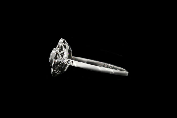 Platinum Diamond Flower Cluster Ring with Diamond Shoulders