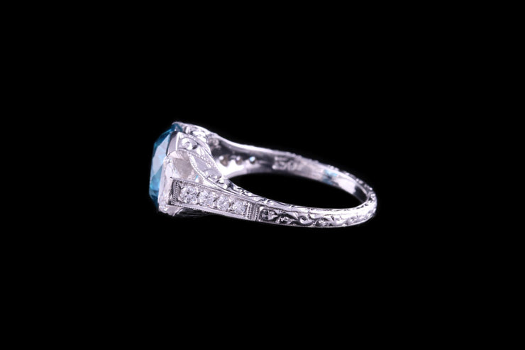18ct White Gold Diamond and Blue Zircon Three Stone Ring