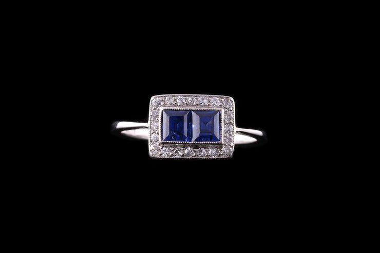 Platinum Sapphire Two Stone Ring with Diamond Surrounds