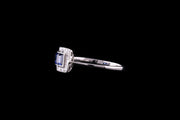 Platinum Sapphire Two Stone Ring with Diamond Surrounds