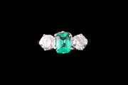 Platinum Diamond and Emerald Three Stone Ring