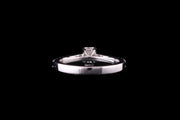 Platinum Emerald Single Stone Ring With Diamond Shoulders