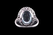 18ct White Gold Diamond and Aquamarine Oval Cluster Ring with Diamond Shoulders