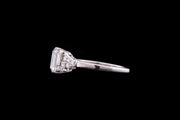 Art Deco Platinum Diamond Single Stone Ring with Decorative Diamond Shoulders