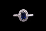 18ct White Gold Diamond and Sapphire Oval Cluster Ring