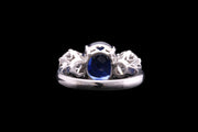 Platinum Diamond and Burma Sapphire Three Stone Ring