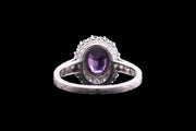 Platinum and Iridium Diamond and Sri Lankan Purple Sapphire Cluster Ring with Diamond Shoulders