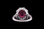 Platinum Diamond and Burma Ruby Oval Cluster Ring with Diamond Shoulders